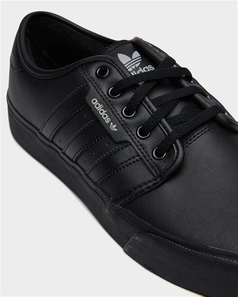 Black adidas Shoes .